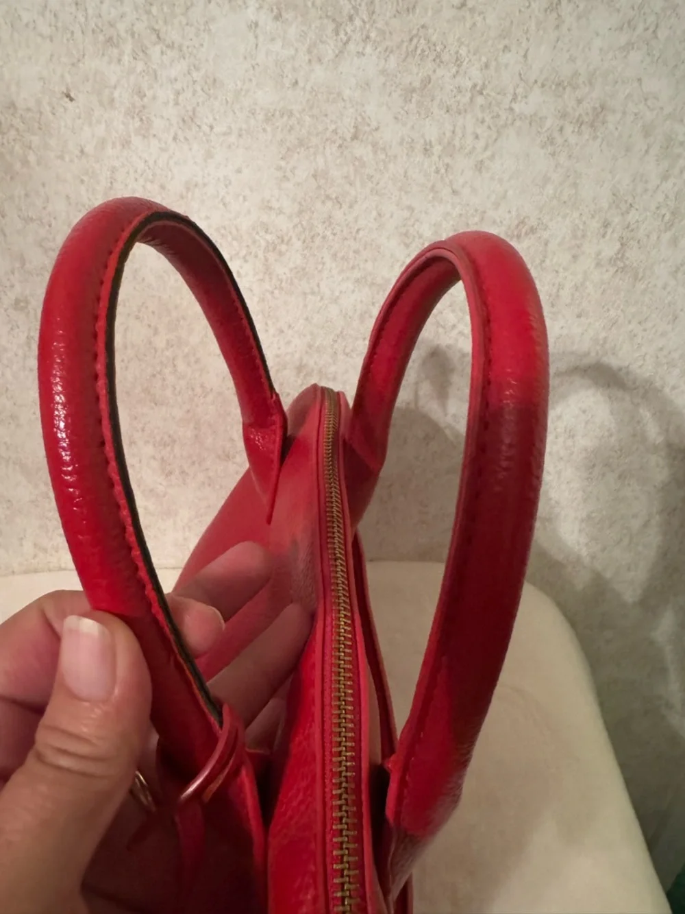 bebe Red Pebbled Fabiola Leather Satchel with Gold Logo Accent with strap.